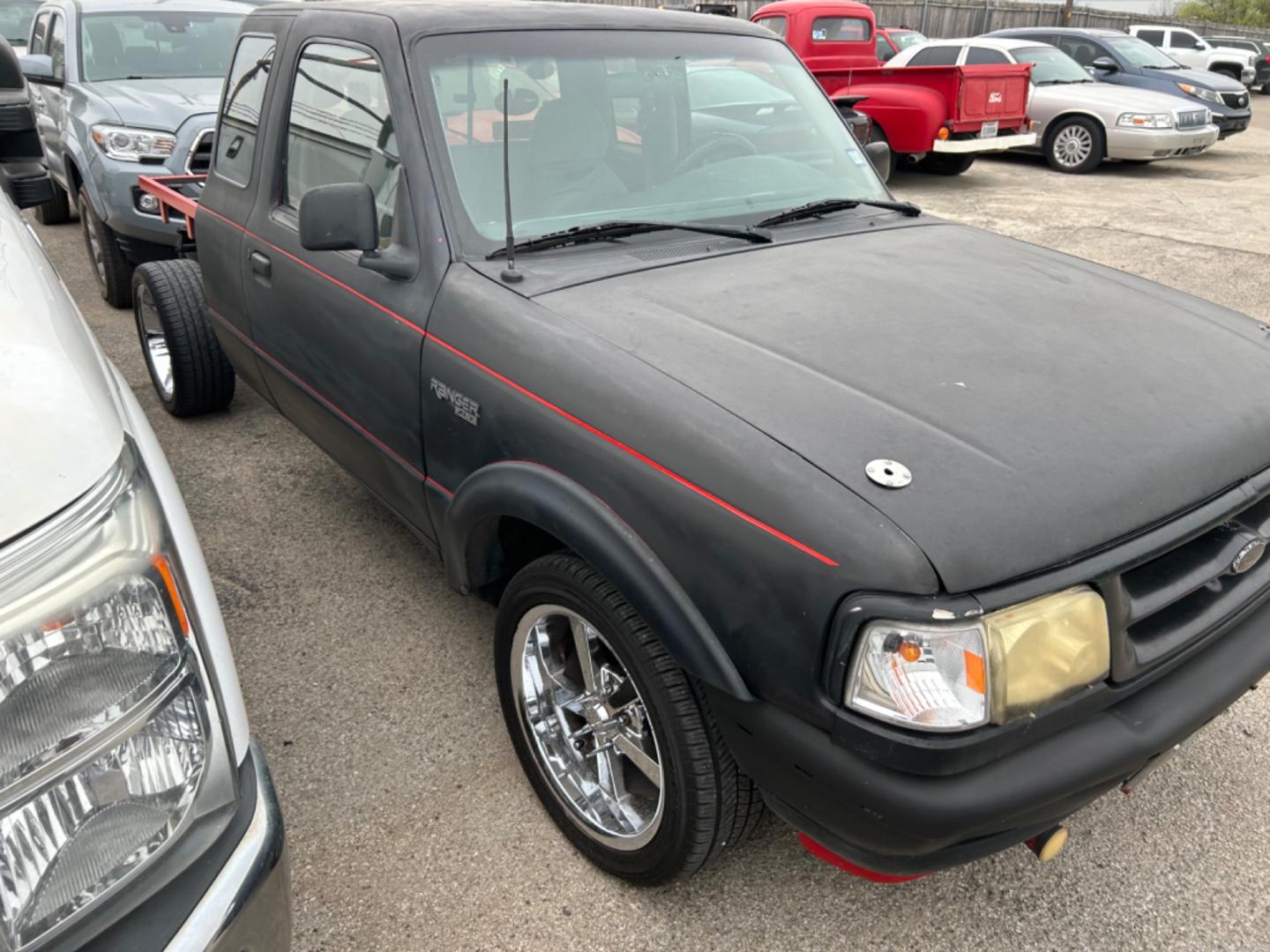 1996 Black Ford Ranger Splash SuperCab 2WD (1FTCR14UXTP) with an 3.0L V6 OHV 12V engine, located at 1687 Business 35 S, New Braunfels, TX, 78130, (830) 625-7159, 29.655487, -98.051491 - Photo#3